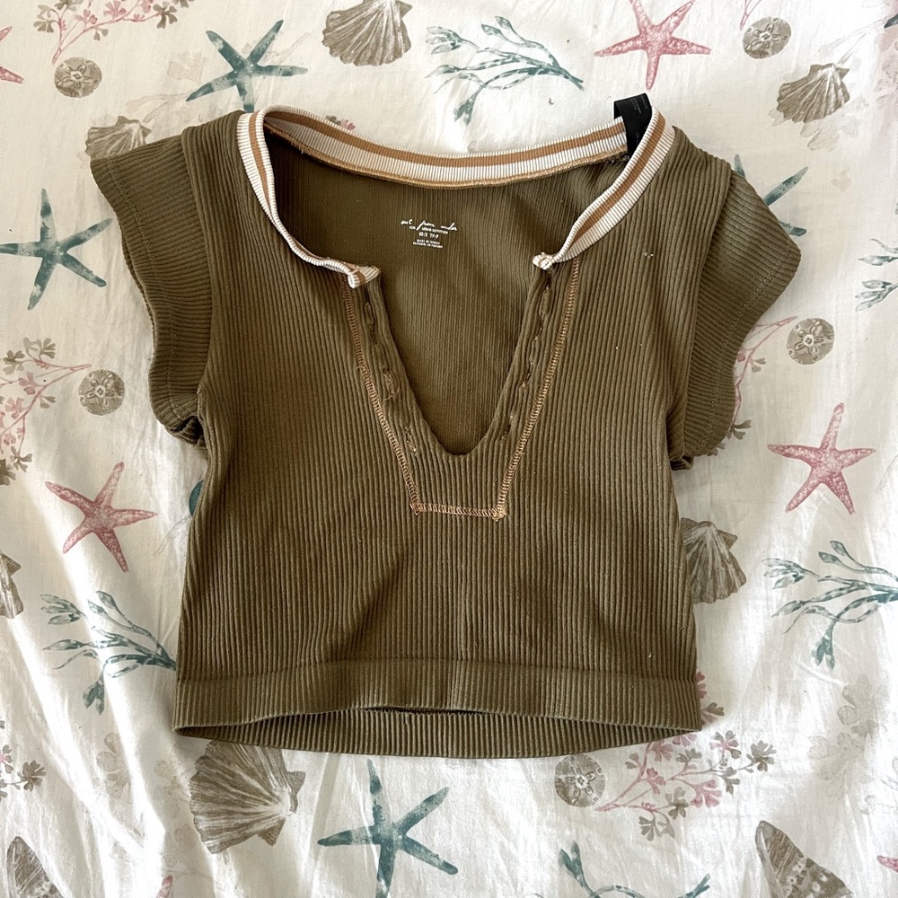 green cropped top